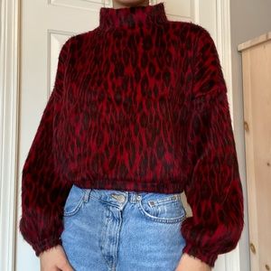Fuzzy red cheetah turtleneck